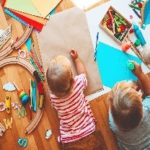 Picture of young children drawing